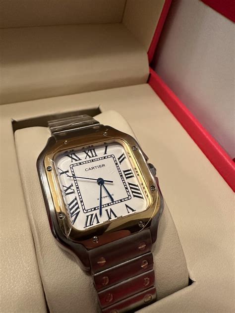 cartier black and gold watch|black cartier santi watch reptime.